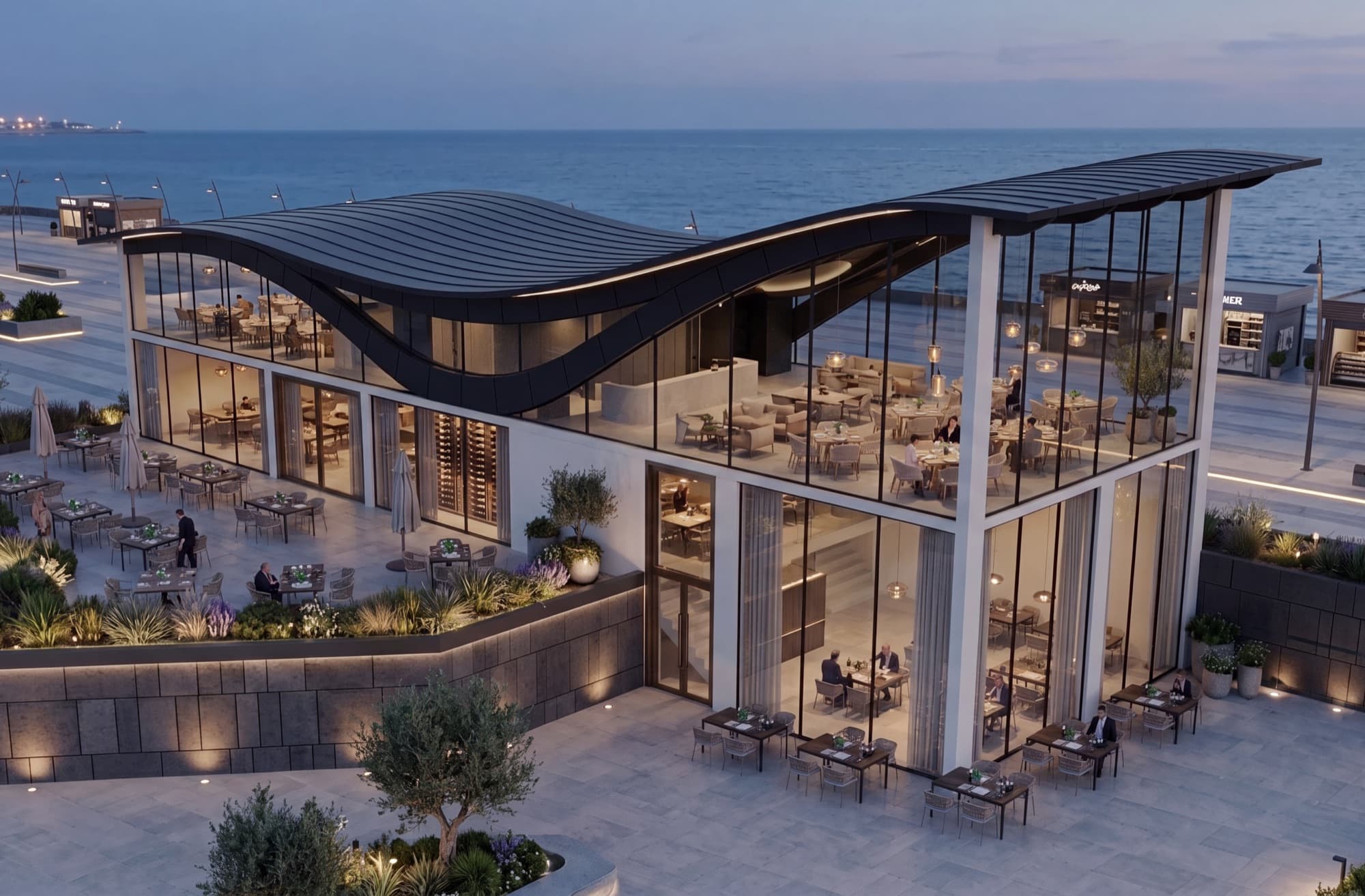 Waterfront restaurant with undulating roof against the open sea